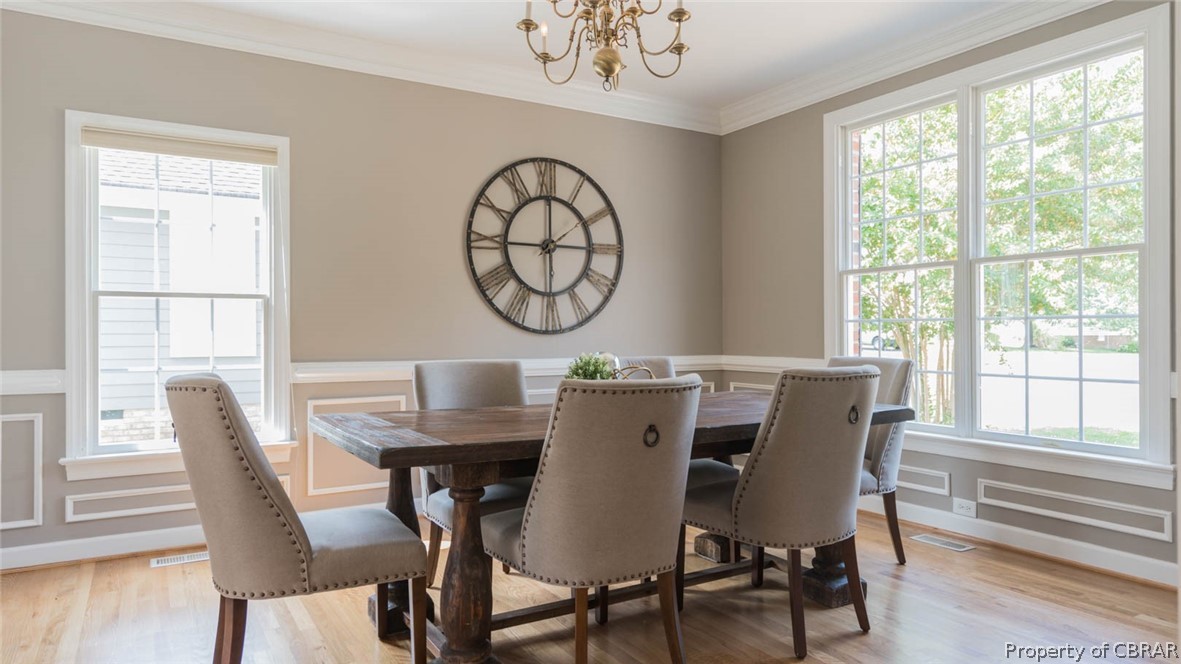 3124 Ridge Drive Toano, VA 23168 - Photo 23 of 50 Formal dining area with crown moulding and custom trimwork.