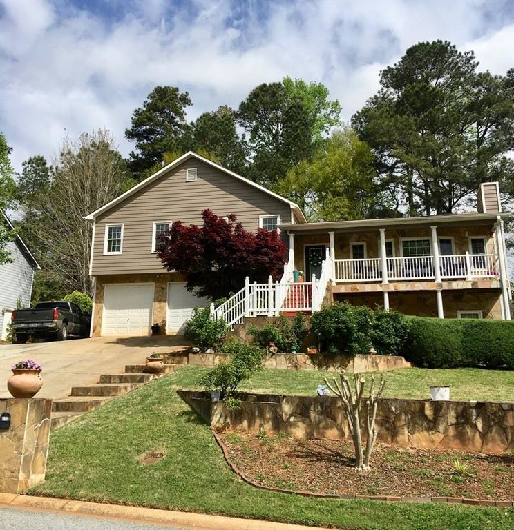 271 Allatoona Road Lawrenceville, GA 30043 - Photo 1 of 1 4 Finished Levels With Double Verandas Overlooking Rose Garden.