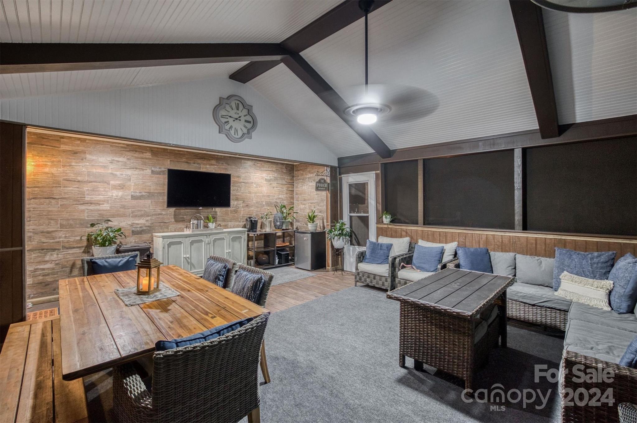 8800 Flowes Store Road Concord, NC 28025 - Photo 23 of 48 a living room with furniture and a flat screen tv