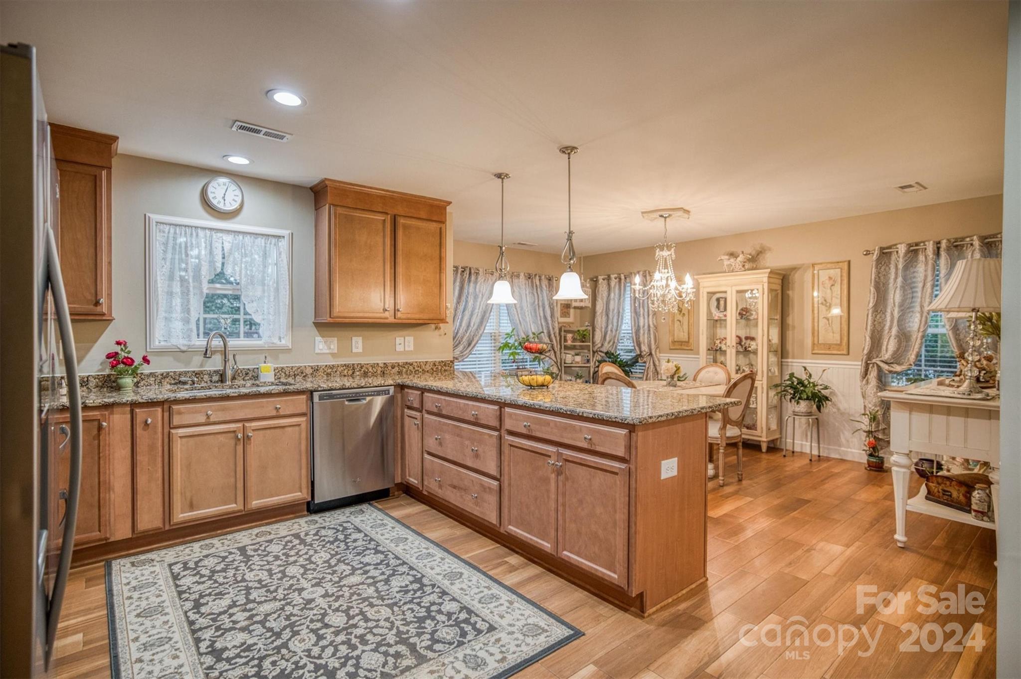 8800 Flowes Store Road Concord, NC 28025 - Photo 36 of 48 a large bathroom with a sink and a large mirror