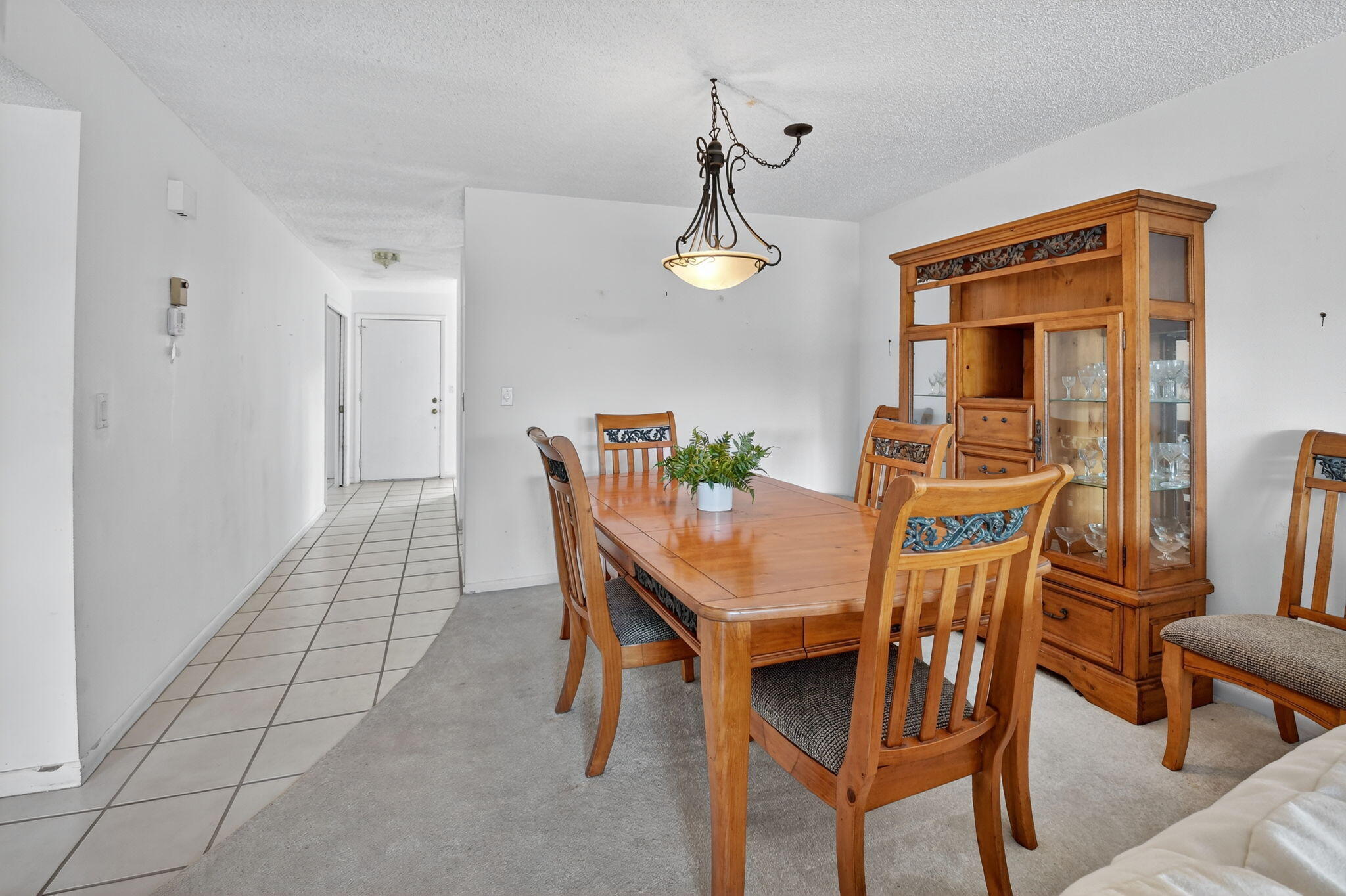 13682 Vía Flora, Unit D Delray Beach, FL 33484 - Photo 12 of 27 a view of a dining room with furniture