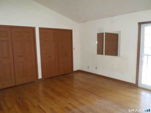 an empty room with windows