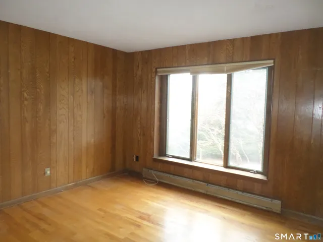 a view of an empty room and window