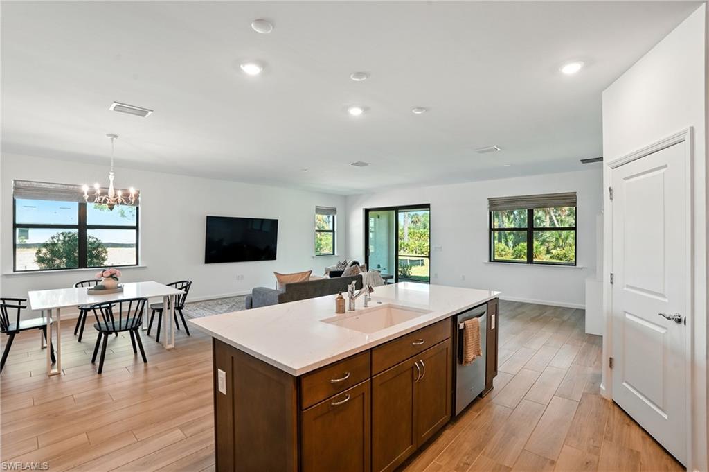 2003 Don Benito Way Naples, FL 34120 - Photo 13 of 45 a kitchen with a sink and wooden floor