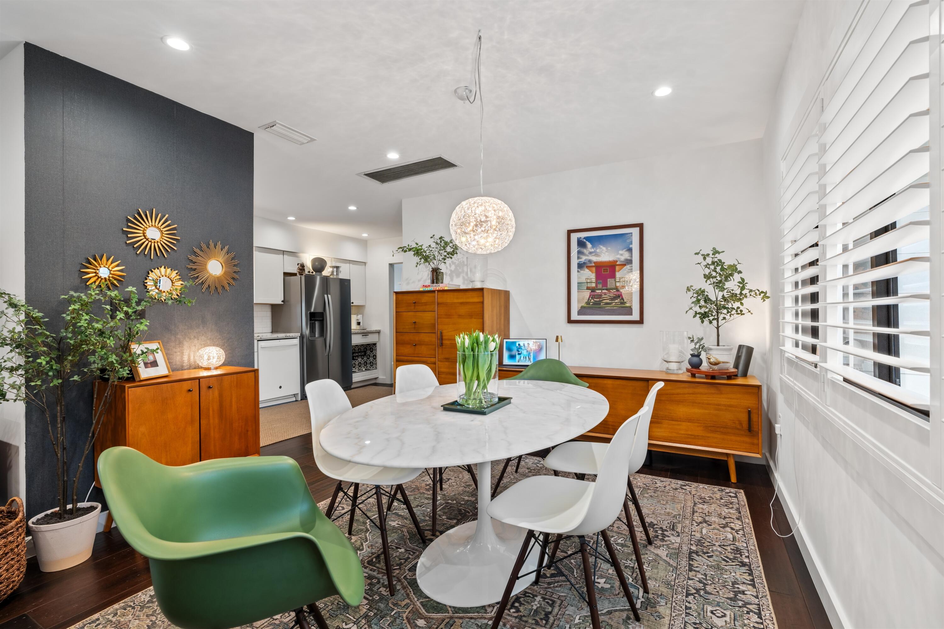 833 Northwest 6th Terrace Boca Raton, FL 33486 - Photo 14 of 49 a dining room with furniture and a potted plant
