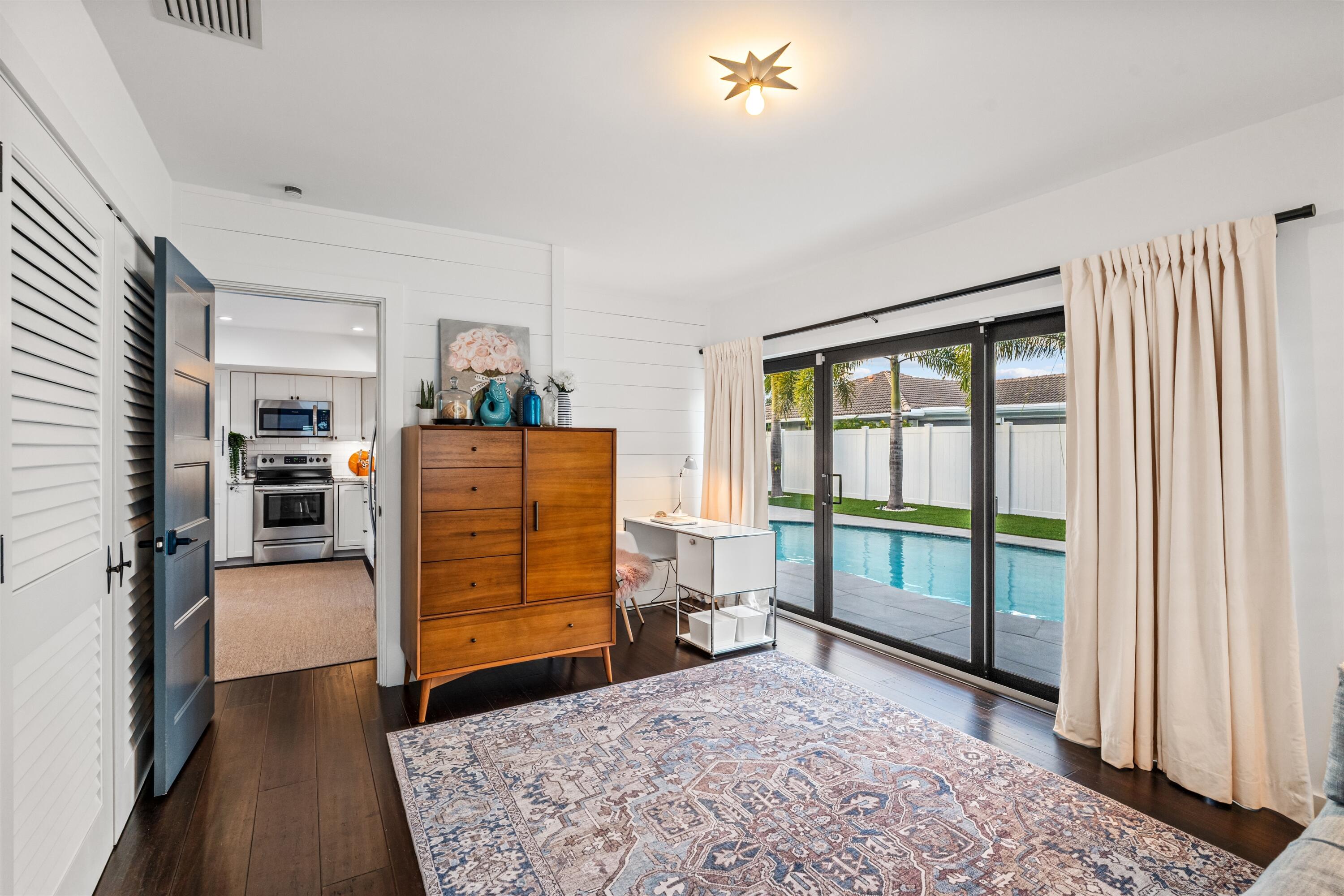833 Northwest 6th Terrace Boca Raton, FL 33486 - Photo 24 of 49 a view of a bedroom with furniture and window