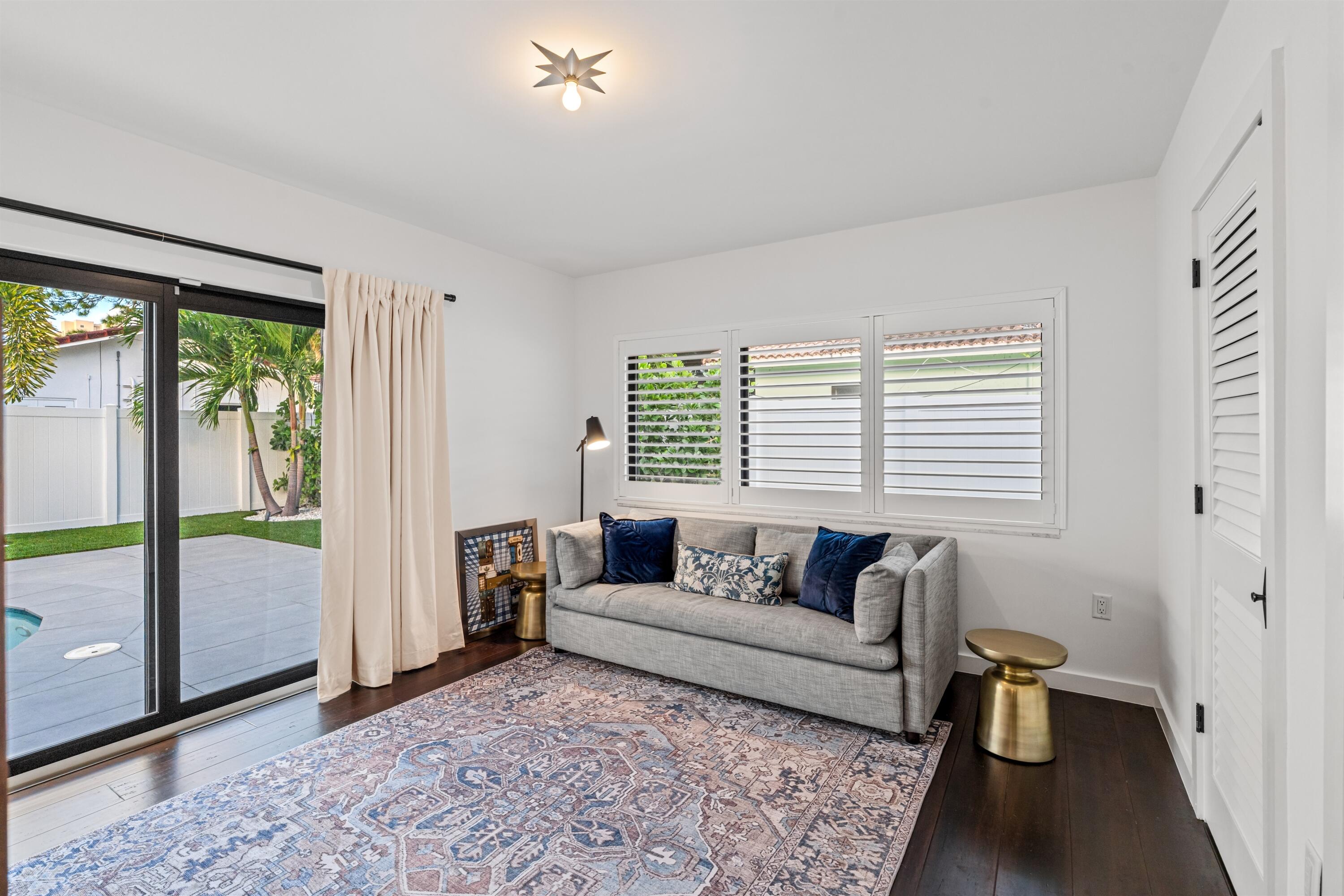 833 Northwest 6th Terrace Boca Raton, FL 33486 - Photo 25 of 49 a living room with furniture and a window