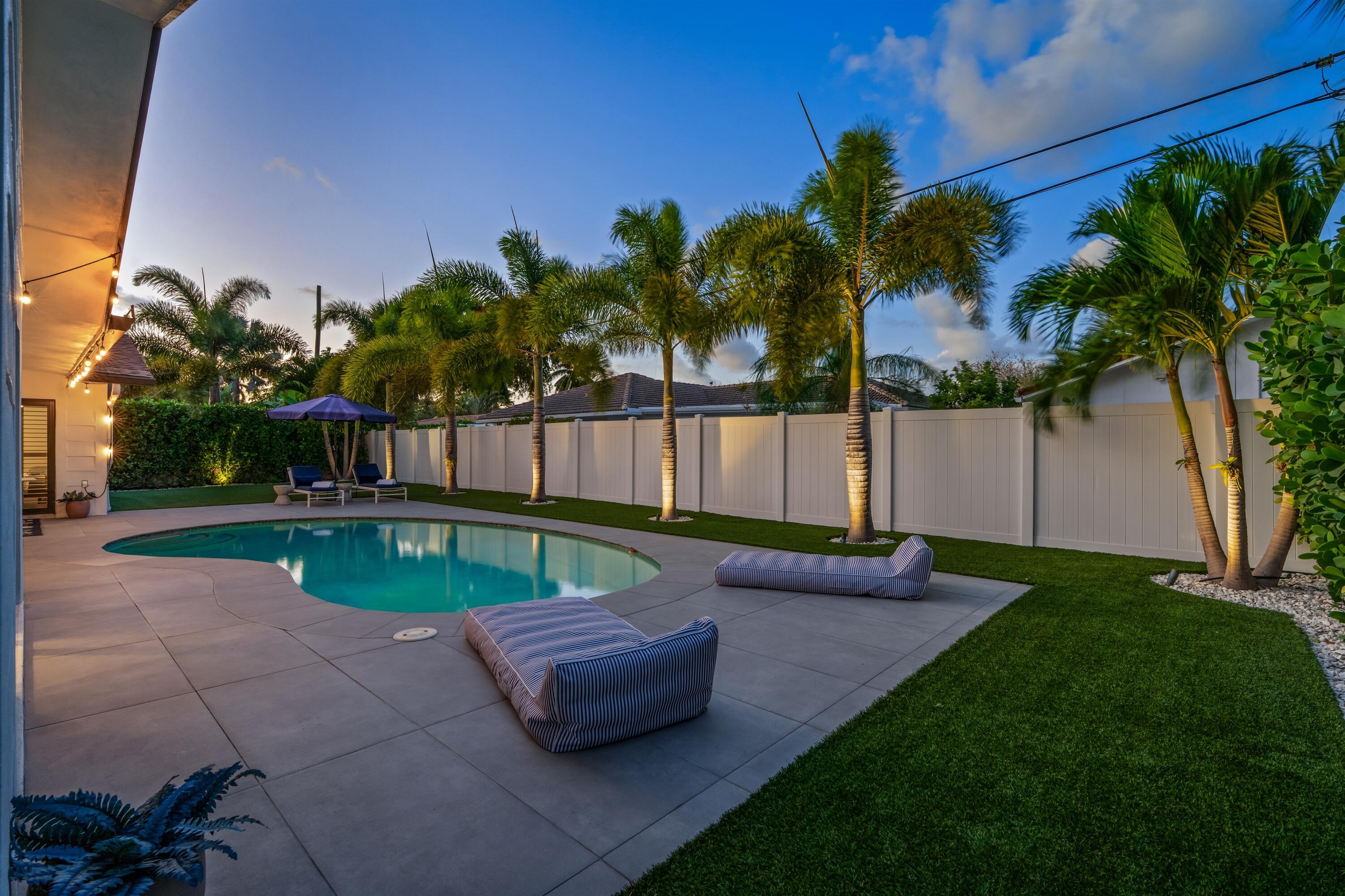 833 Northwest 6th Terrace Boca Raton, FL 33486 - Photo 29 of 49 a garden view with a seating space