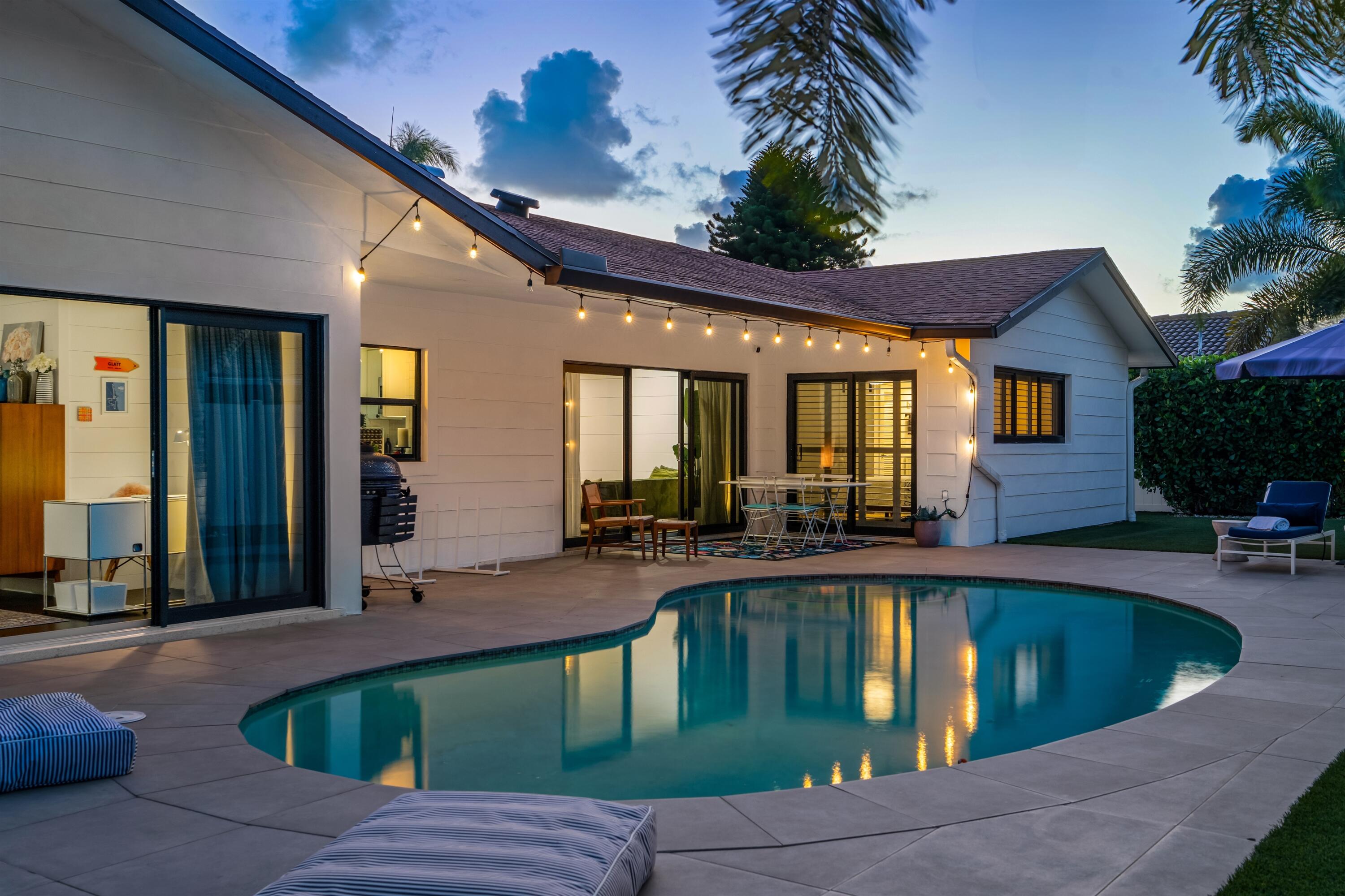 833 Northwest 6th Terrace Boca Raton, FL 33486 - Photo 31 of 49 a view of swimming pool with outdoor seating