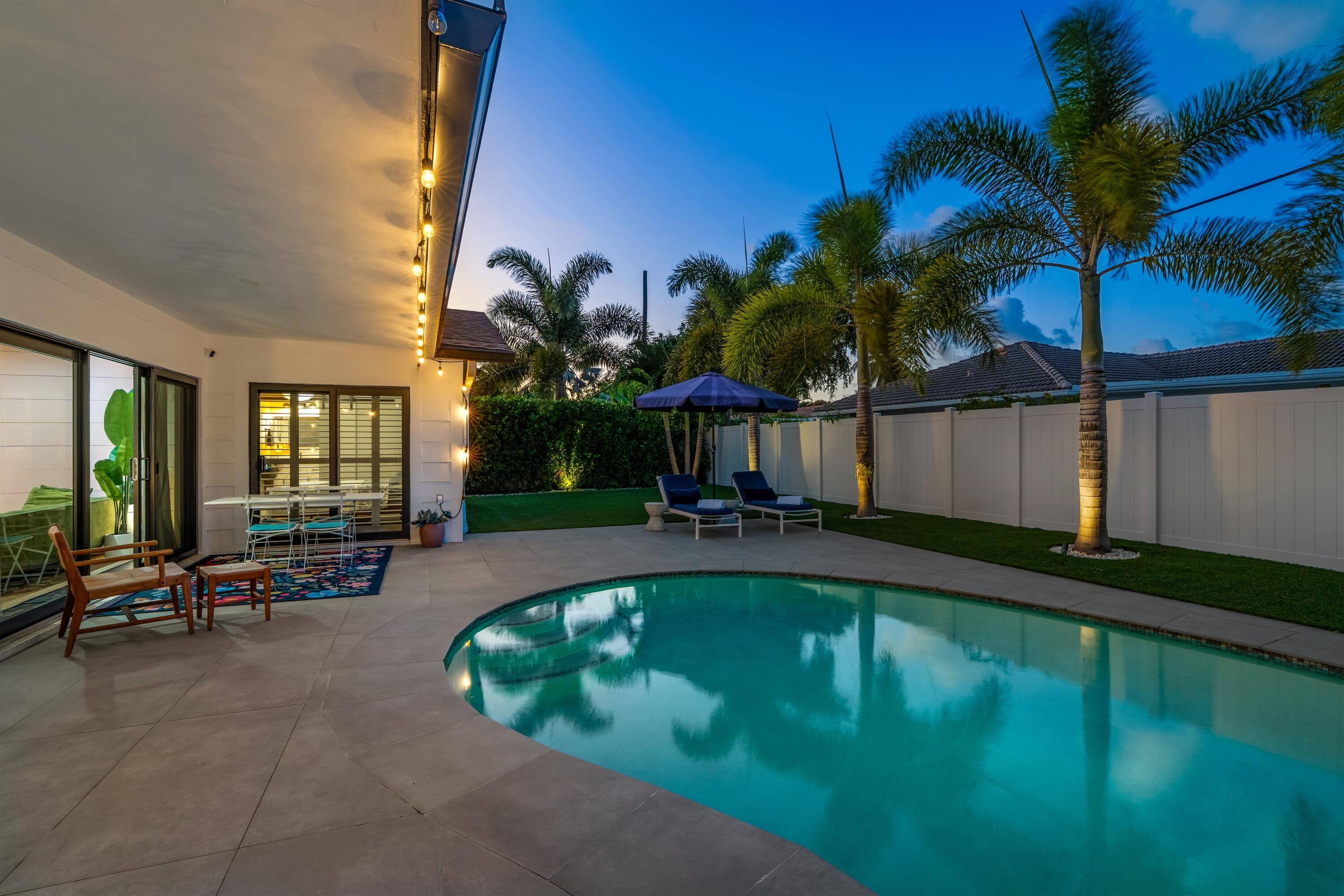 833 Northwest 6th Terrace Boca Raton, FL 33486 - Photo 32 of 49 a view of swimming pool with outdoor seating