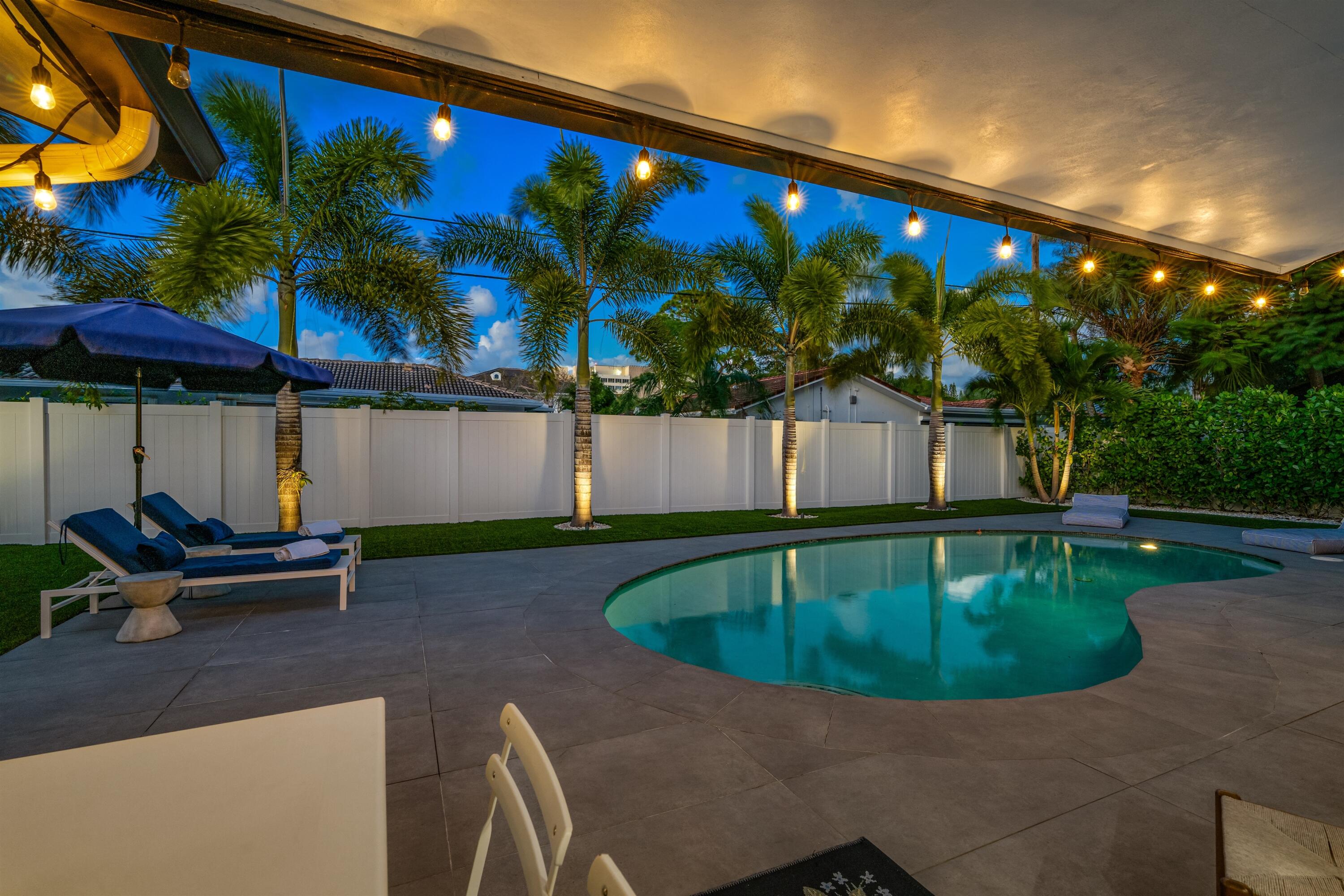 833 Northwest 6th Terrace Boca Raton, FL 33486 - Photo 33 of 49 a view of a swimming pool with a patio