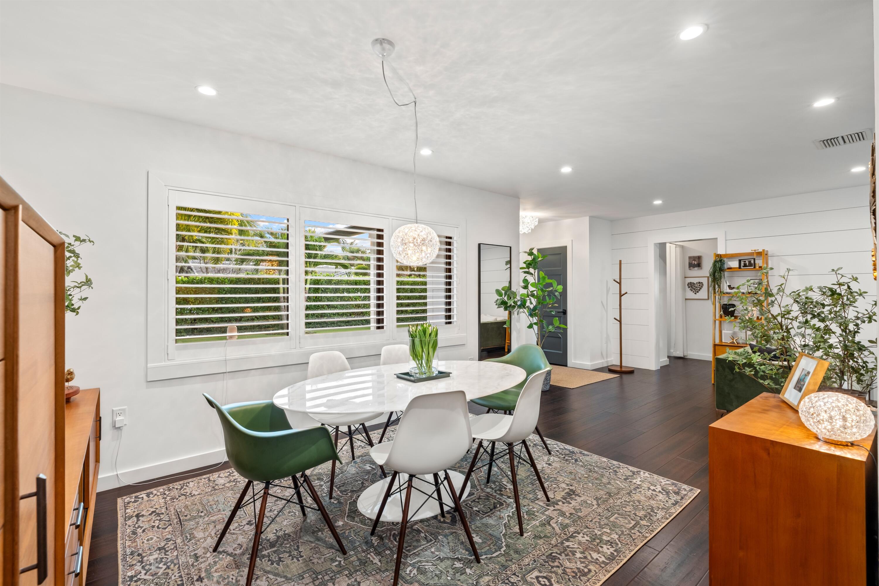 833 Northwest 6th Terrace Boca Raton, FL 33486 - Photo 9 of 49 a view of a dining room with furniture window and wooden floor