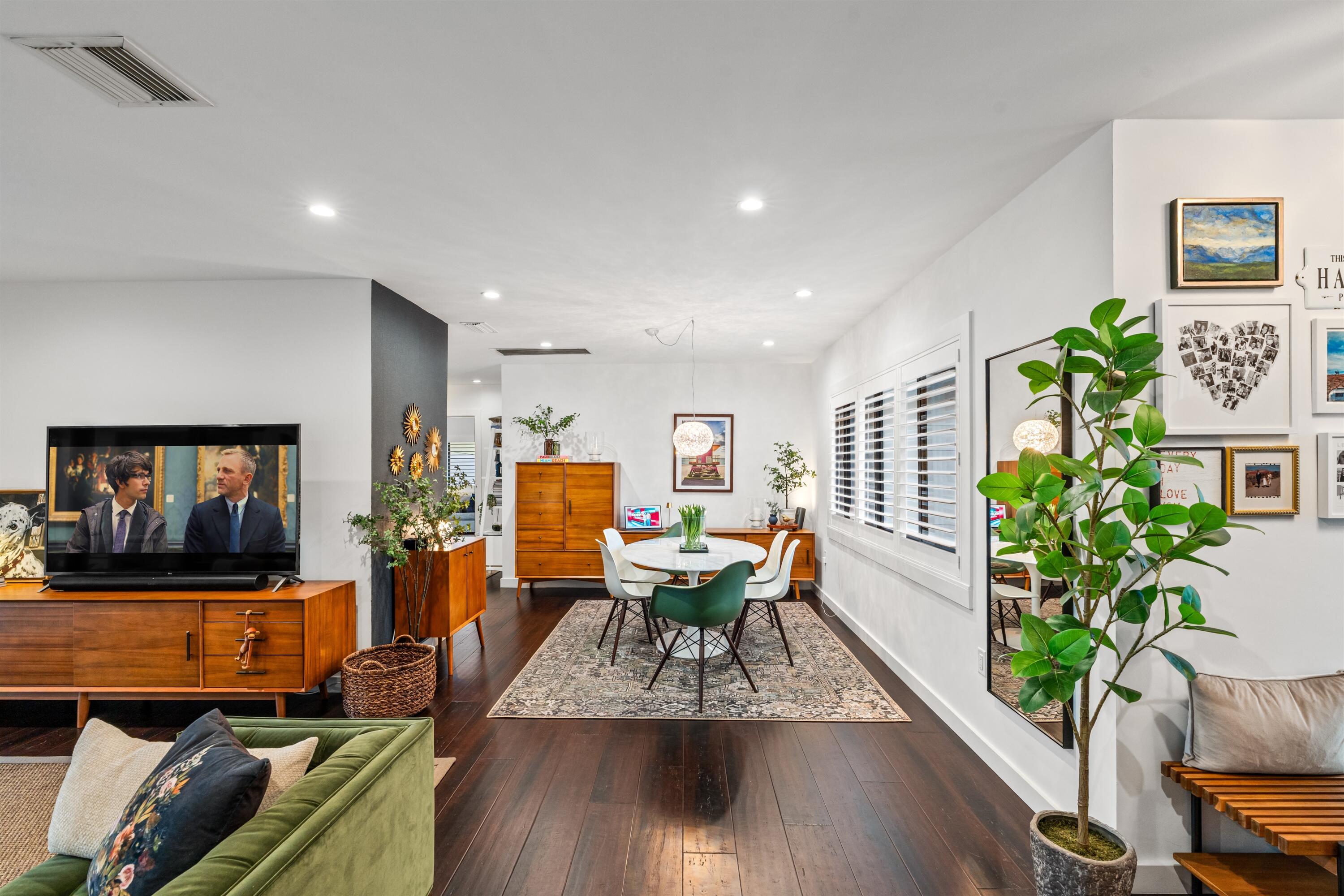833 Northwest 6th Terrace Boca Raton, FL 33486 - Photo 10 of 49 a living room with furniture and a flat screen tv