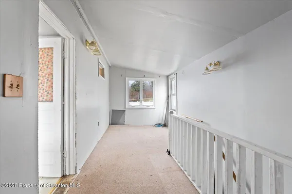 a utility room with cabinets washer and dryer