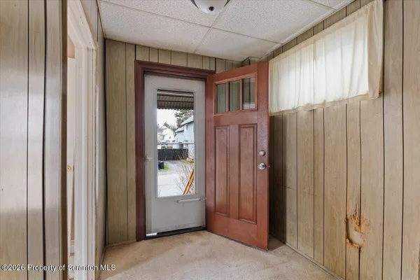 a view of an entryway with a livingroom