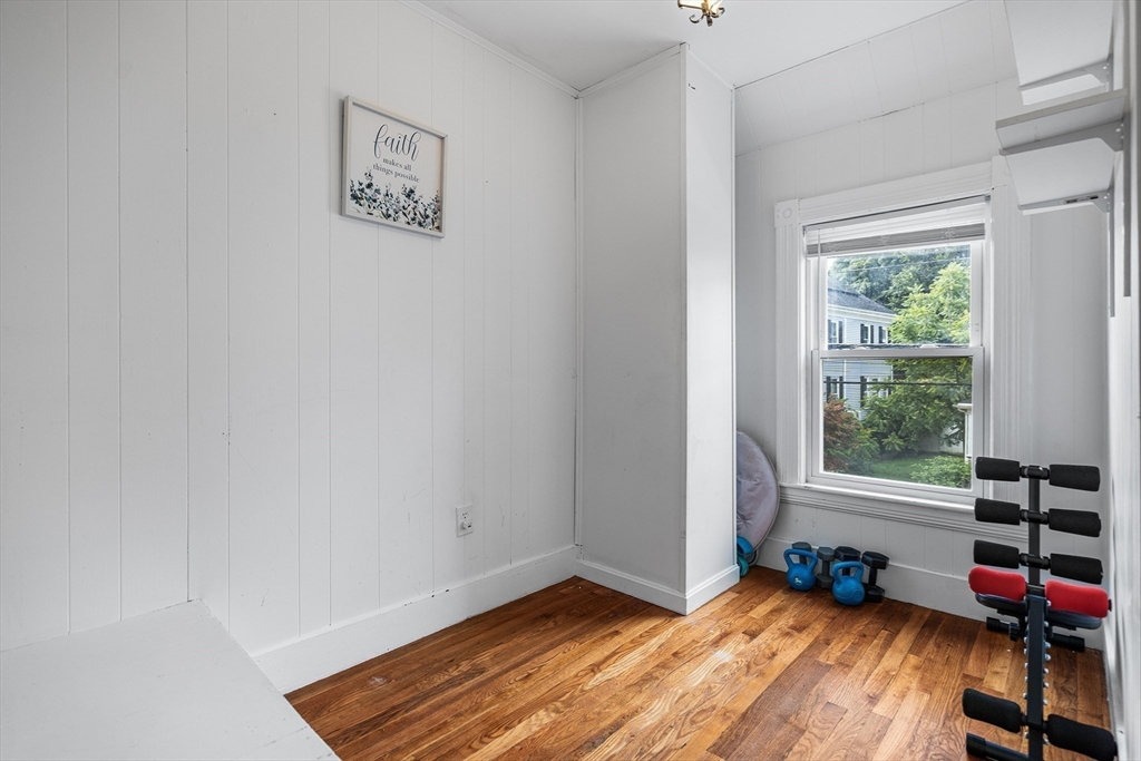 4 State Street, Unit 4 Milford, MA 01757 - Photo 16 of 23 a view of room with a window and wooden floor