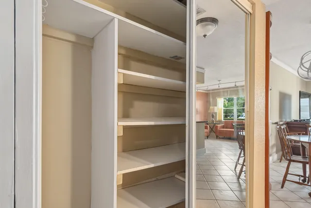 a view of a livingroom with table and chair
