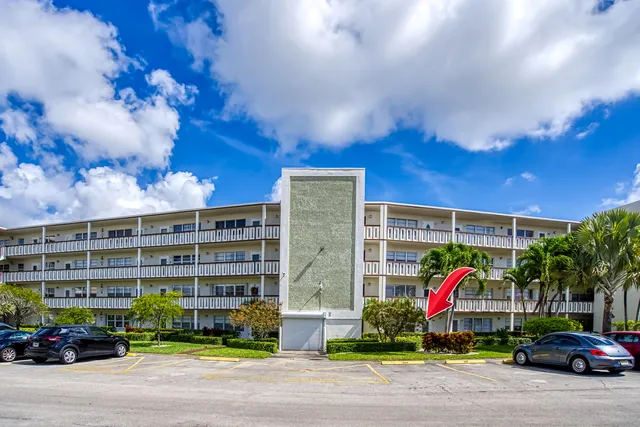 a childrens building with trees in front of it