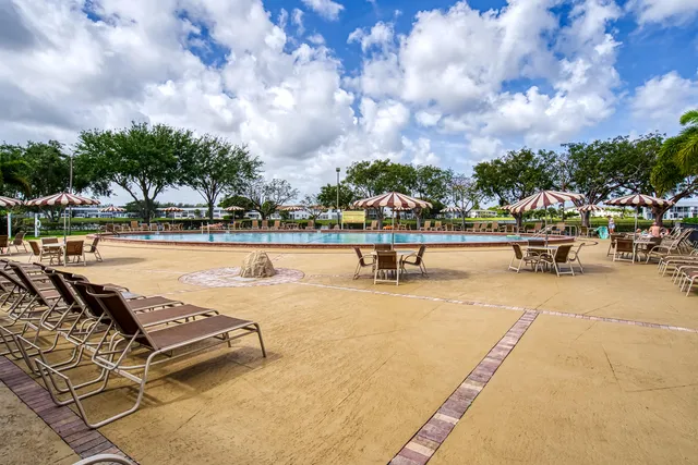 a view of a lake with a building in the background