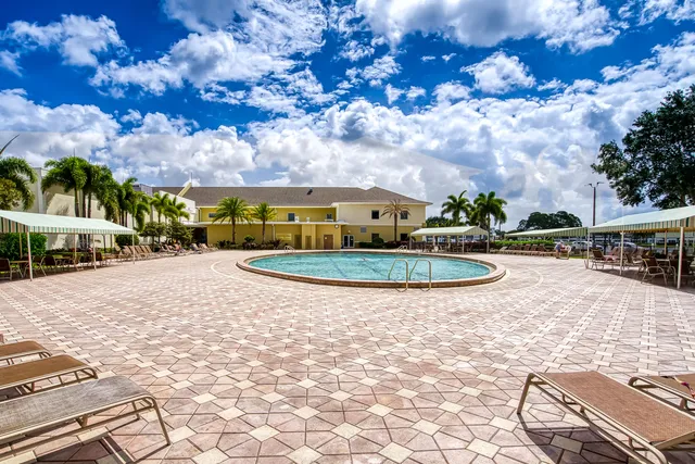a view of lake with green space