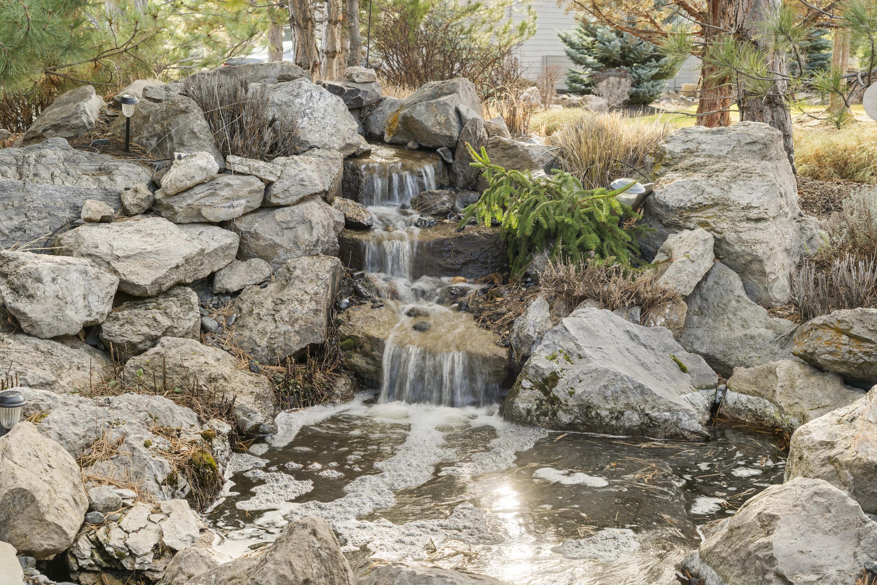 784 Ribbon Falls Road Redmond, OR 97756 - Photo 32 of 79 a view of a wooden wall with a tree