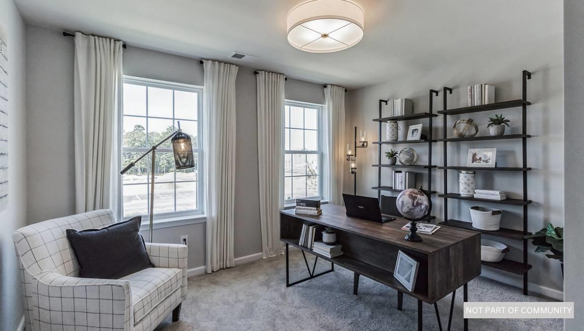 601 Scotty, Unit 1404 Rio Grande, NJ 08242 - Photo 11 of 26 a living room with furniture a rug and a large window