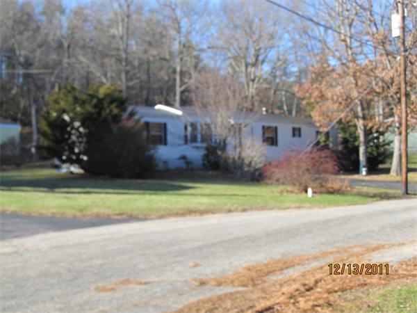 61 Gauthier Road Petersham, MA 01366 - Photo 2 of 7 a front view of house with yard and trees