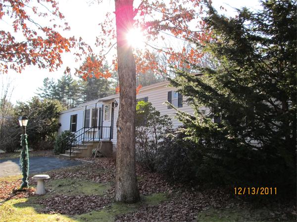 61 Gauthier Road Petersham, MA 01366 - Photo 6 of 7 a view of a house with a tree