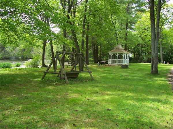 61 Gauthier Road Petersham, MA 01366 - Photo 7 of 7 a view of a house with a big yard
