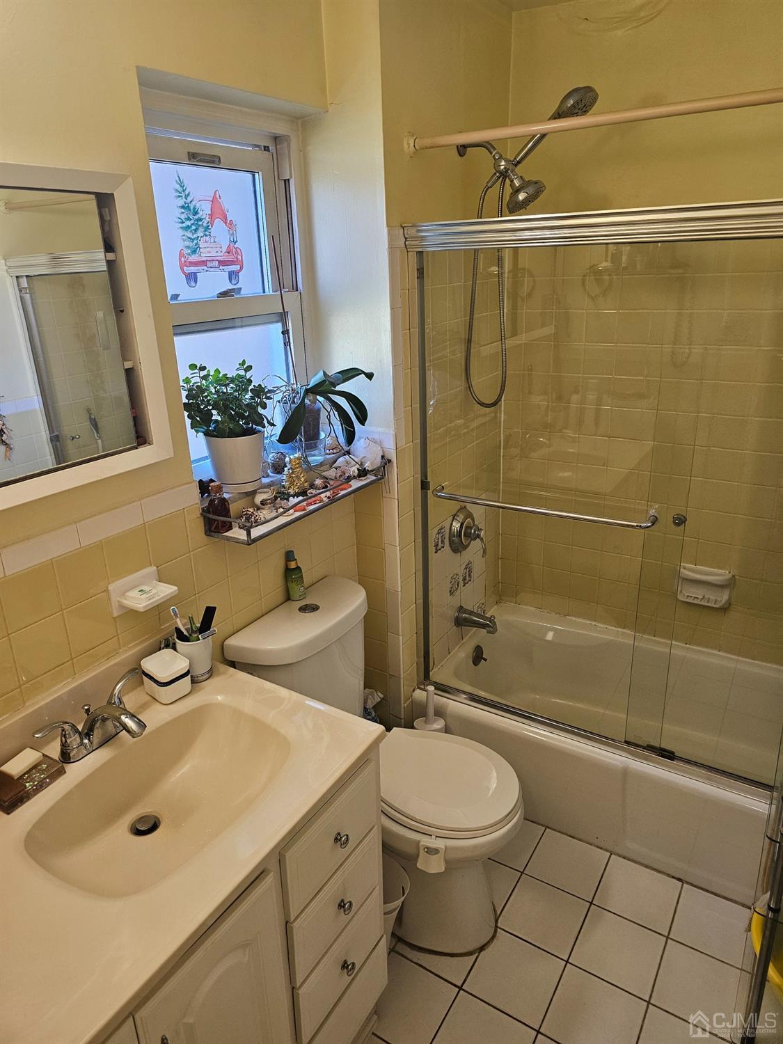 183 Evergreen Road, Unit 6A Edison, NJ 08837 - Photo 19 of 23 a bathroom with a sink toilet and shower