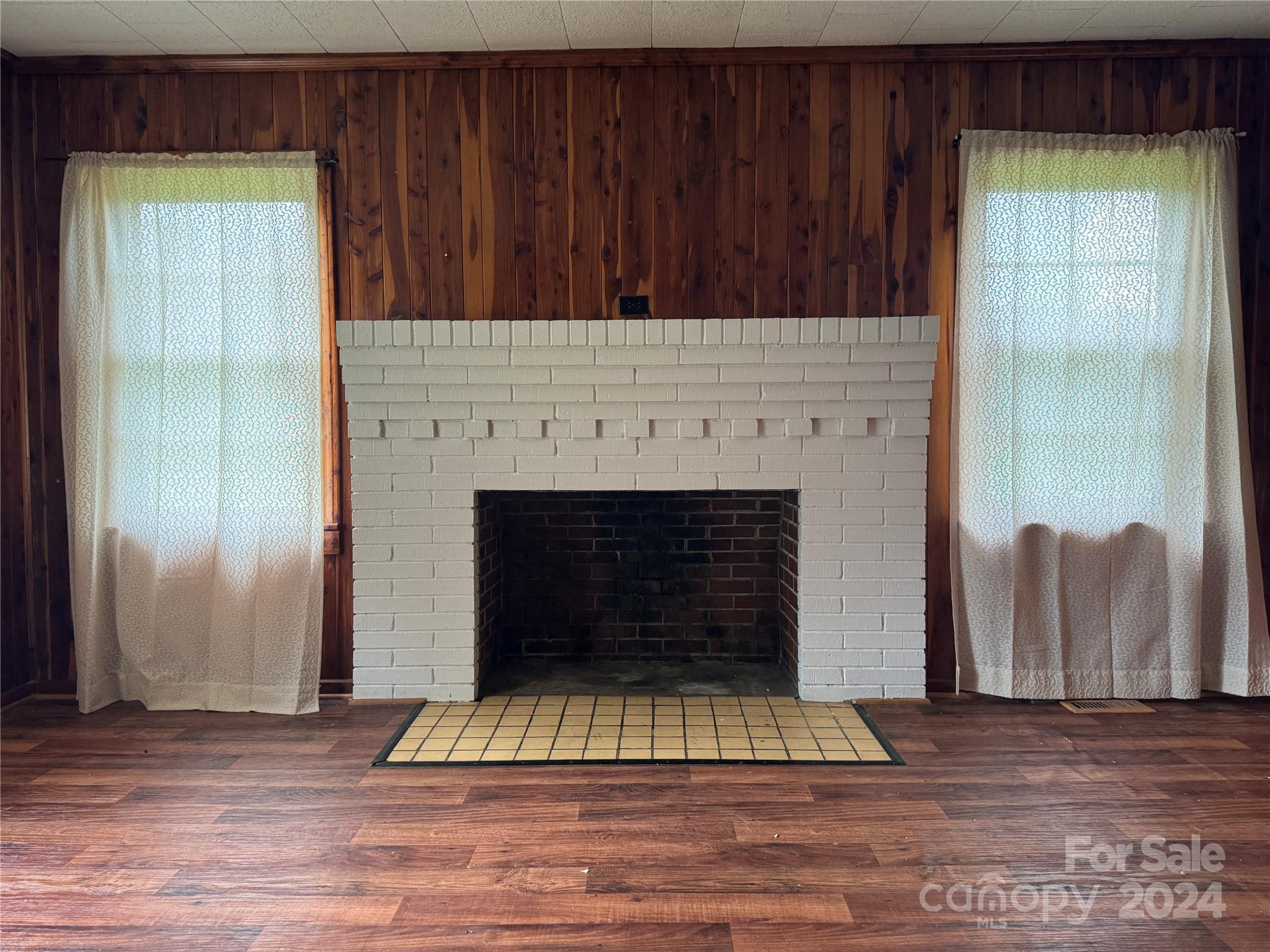 1555 Lower Palmer Road Rockwell, NC 28138 - Photo 13 of 17 a view of fireplace with wooden floor