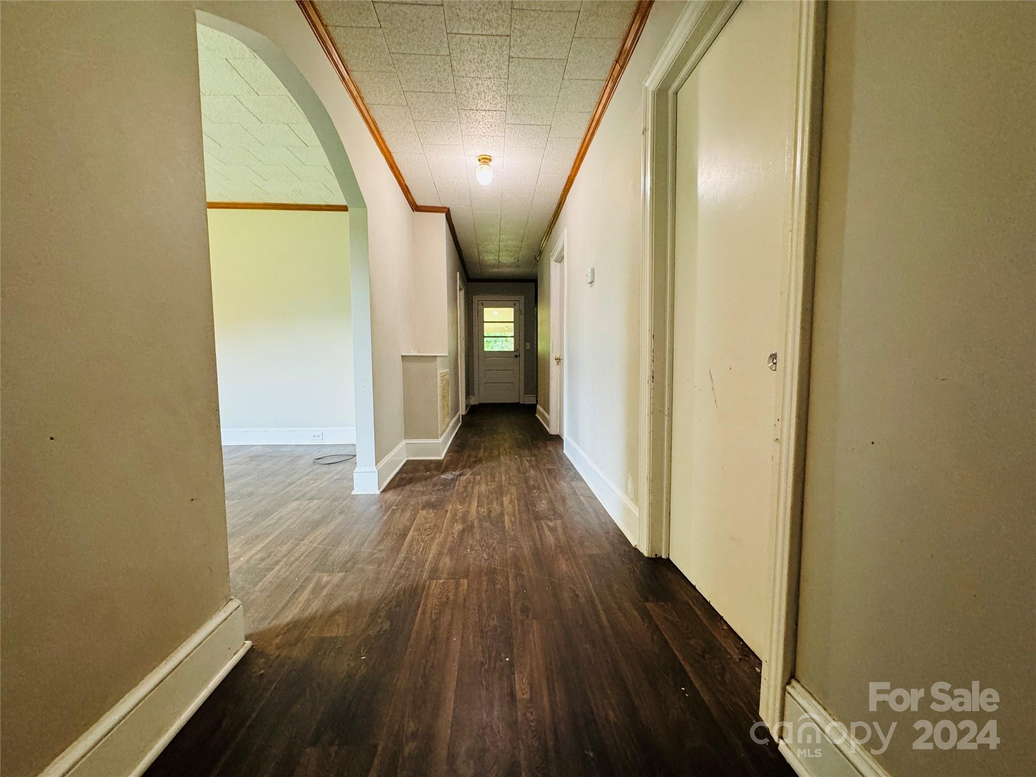 1555 Lower Palmer Road Rockwell, NC 28138 - Photo 8 of 17 a view of a hallway with wooden floor