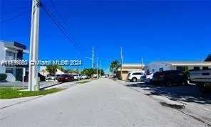 a view of a cars parked in front of a building