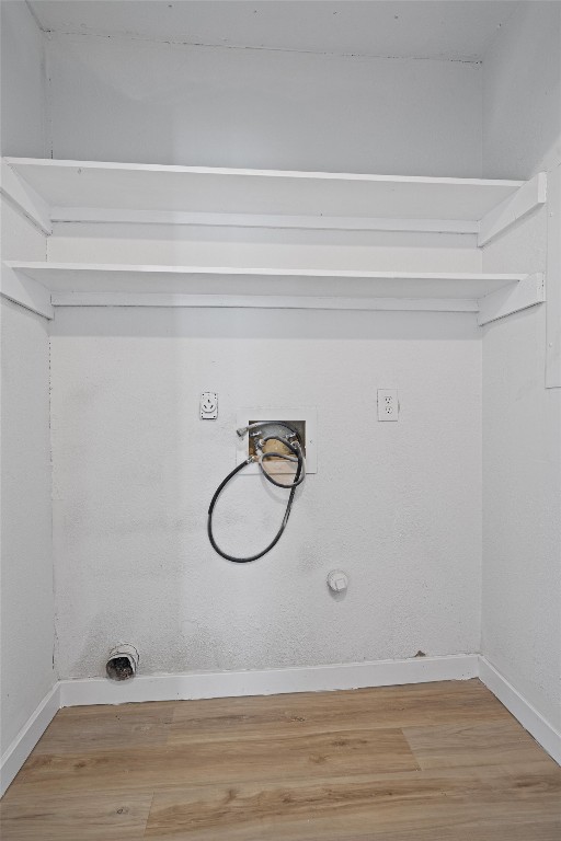 520 Lenora Drive, Unit A Taylor, TX 76574 - Photo 21 of 24 a bathroom with a sink and a shower