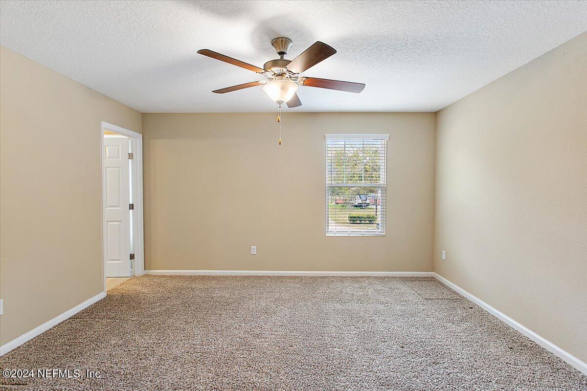 2456 Tebassa Road Jacksonville, FL 32216 - Photo 8 of 14 07-Primary Bedroom