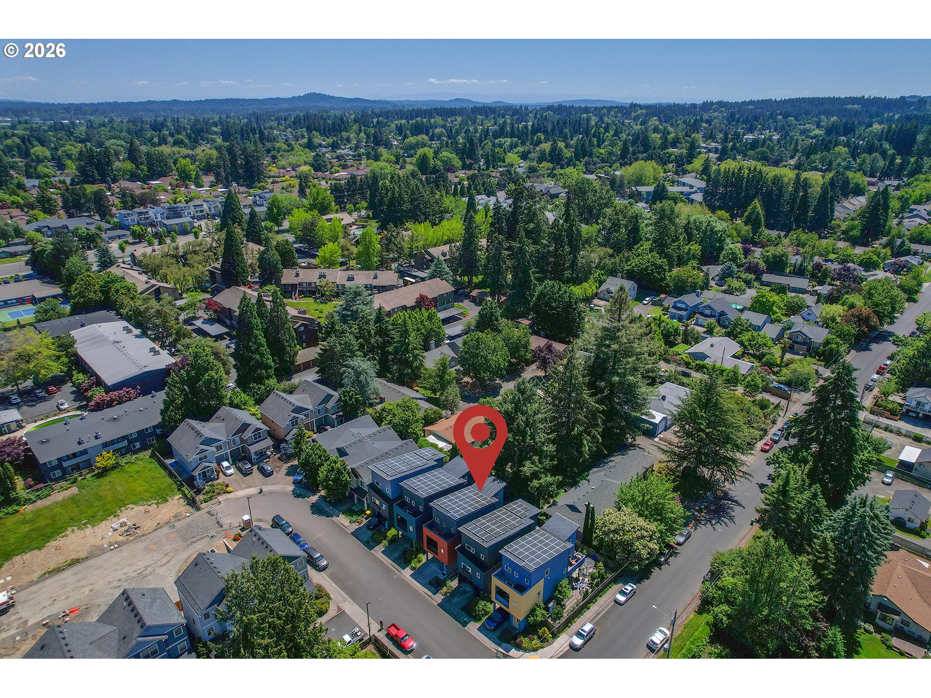 14794 Southwest Watershed Lane Beaverton, OR 97007 - Photo 43 of 46 an aerial view of a house with a yard and lake view