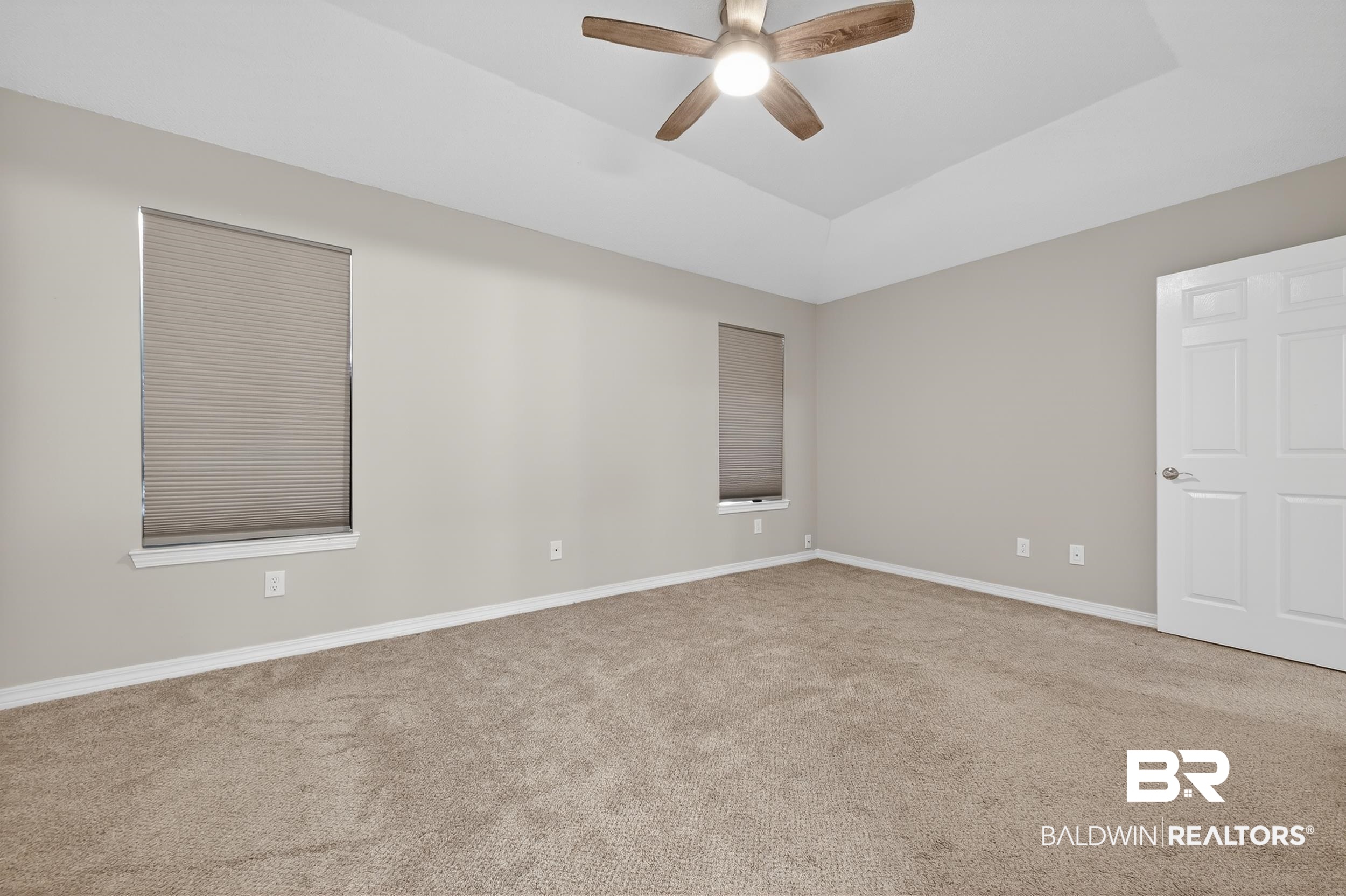 7050 Highpointe Place West Daphne, AL 36527 - Photo 47 of 66 Empty room featuring carpet flooring and a ceiling fan