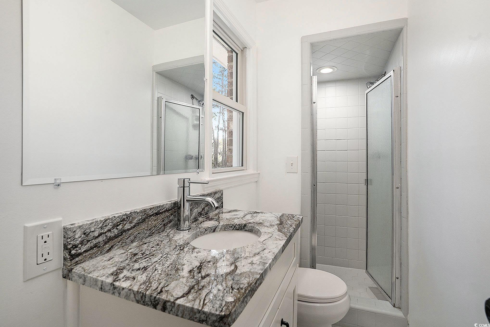 494 Ray Road Hemingway, SC 29554 - Photo 22 of 26 Bathroom featuring a stall shower and vanity