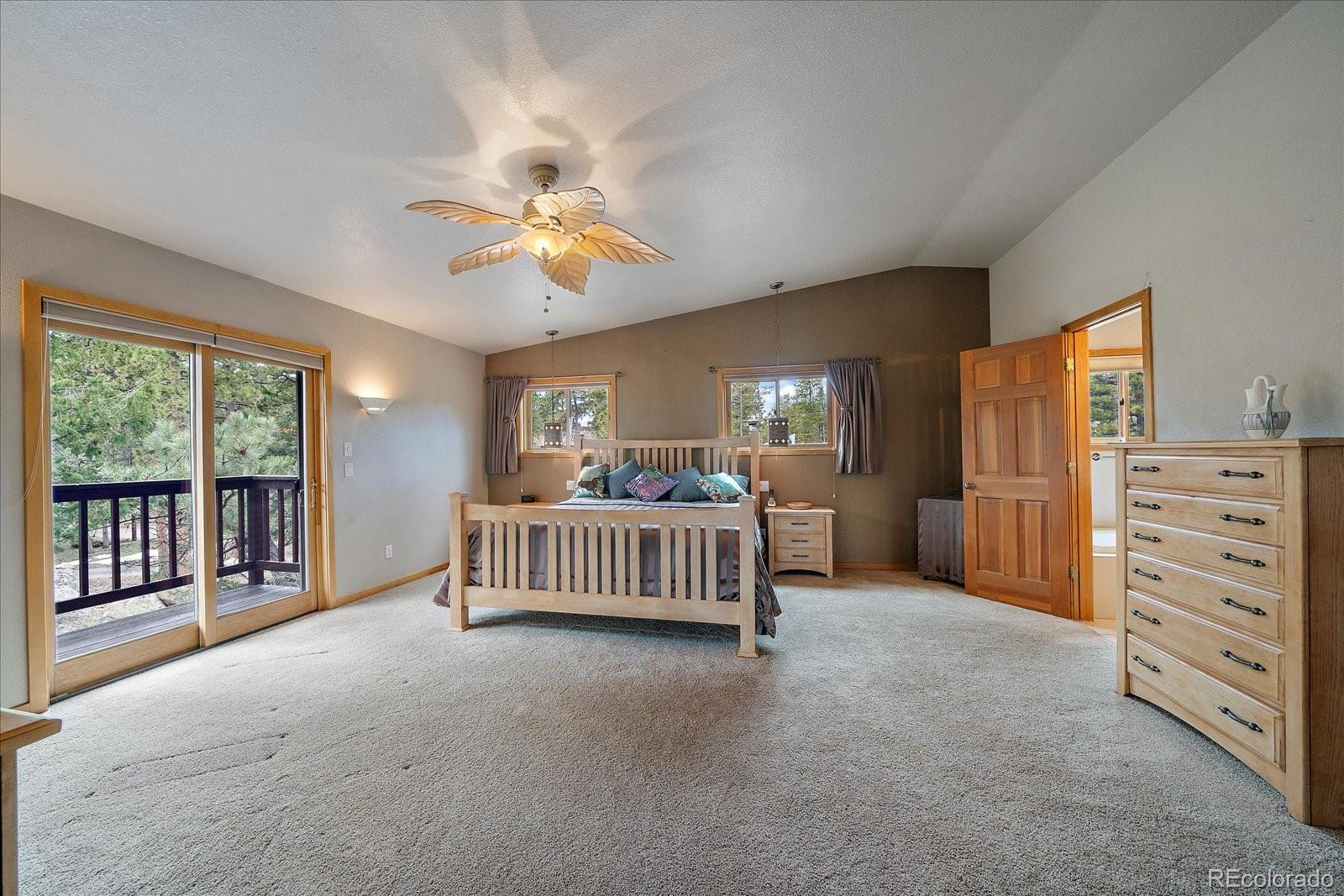 19791 Maxwell Drive Morrison, CO 80465 - Photo 29 of 50 a view of livingroom with furniture and windows