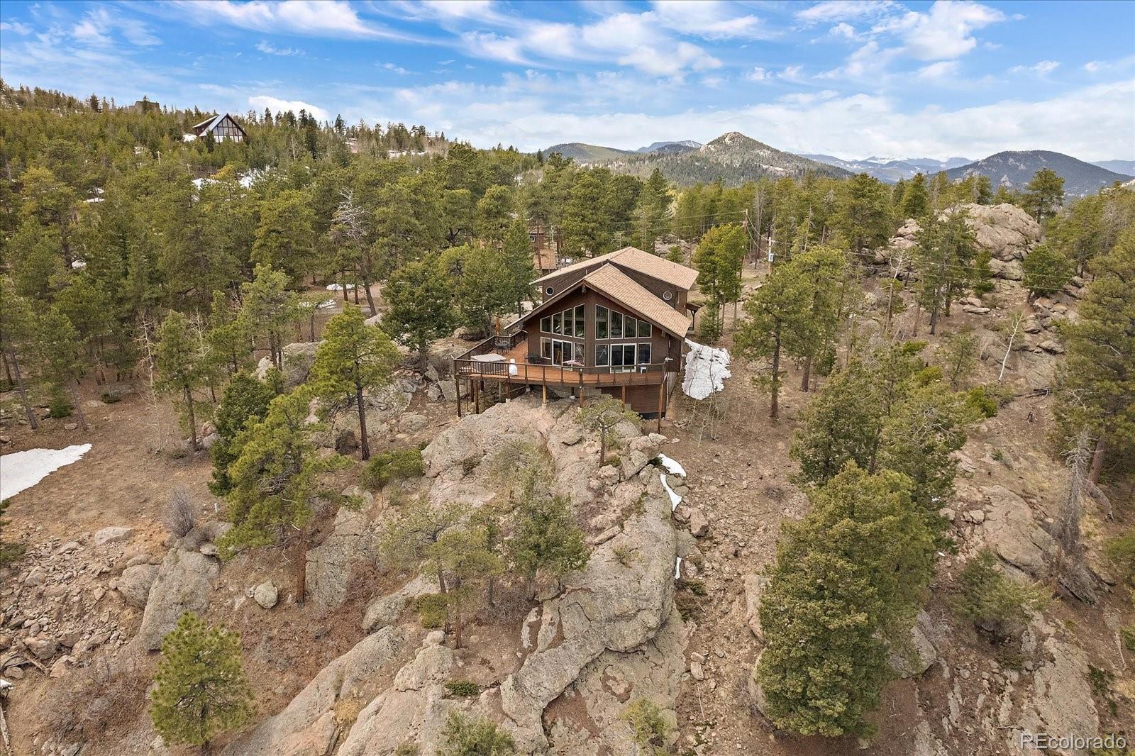 19791 Maxwell Drive Morrison, CO 80465 - Photo 36 of 50 a view of a city with mountain