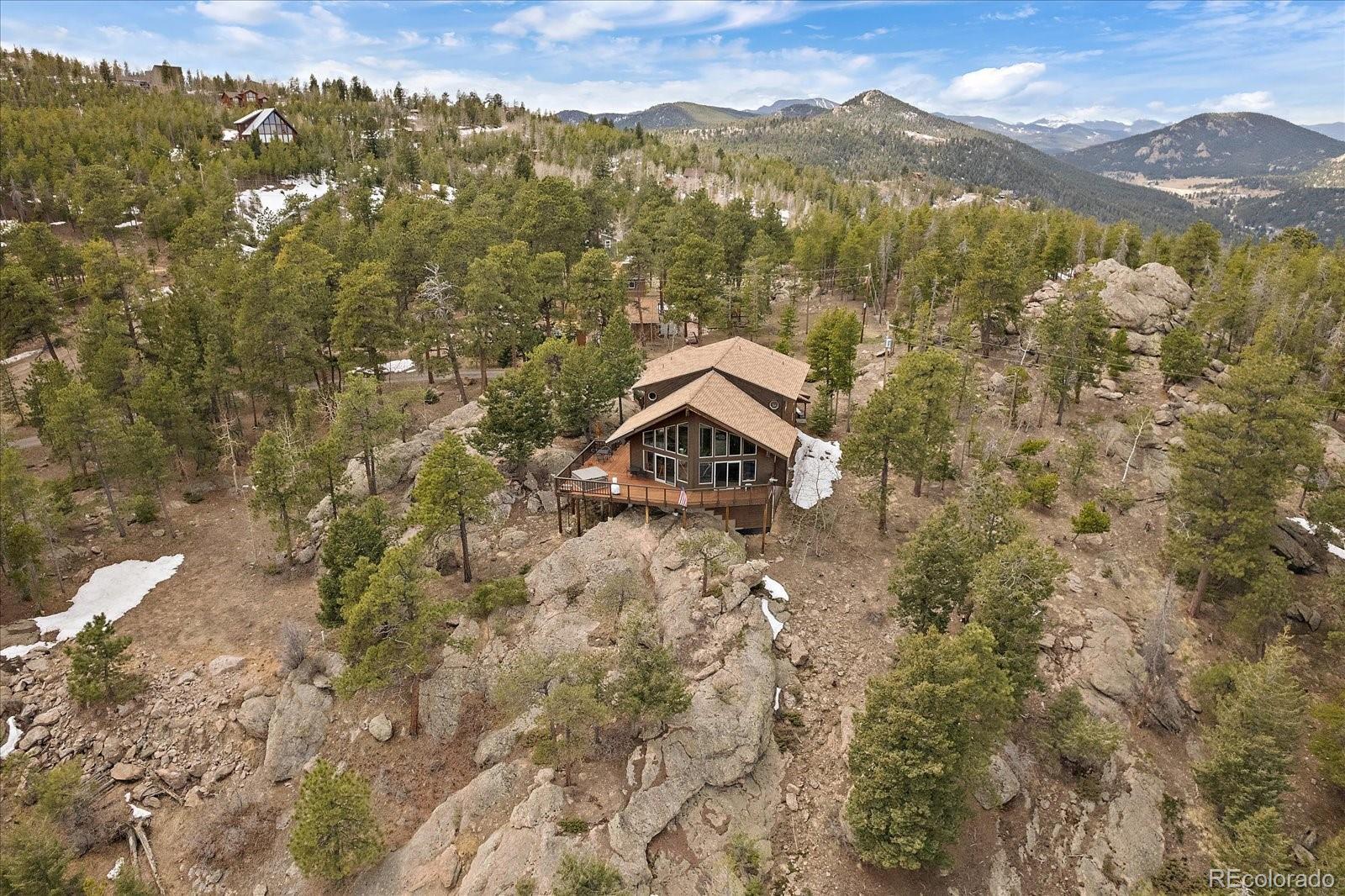 19791 Maxwell Drive Morrison, CO 80465 - Photo 47 of 50 a view of a houses with a mountain