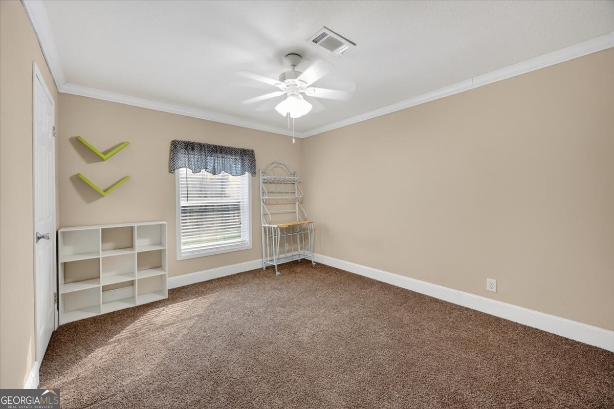 550 Damascus Church Road Haddock, GA 31033 - Photo 18 of 34 a view of an empty room with a window