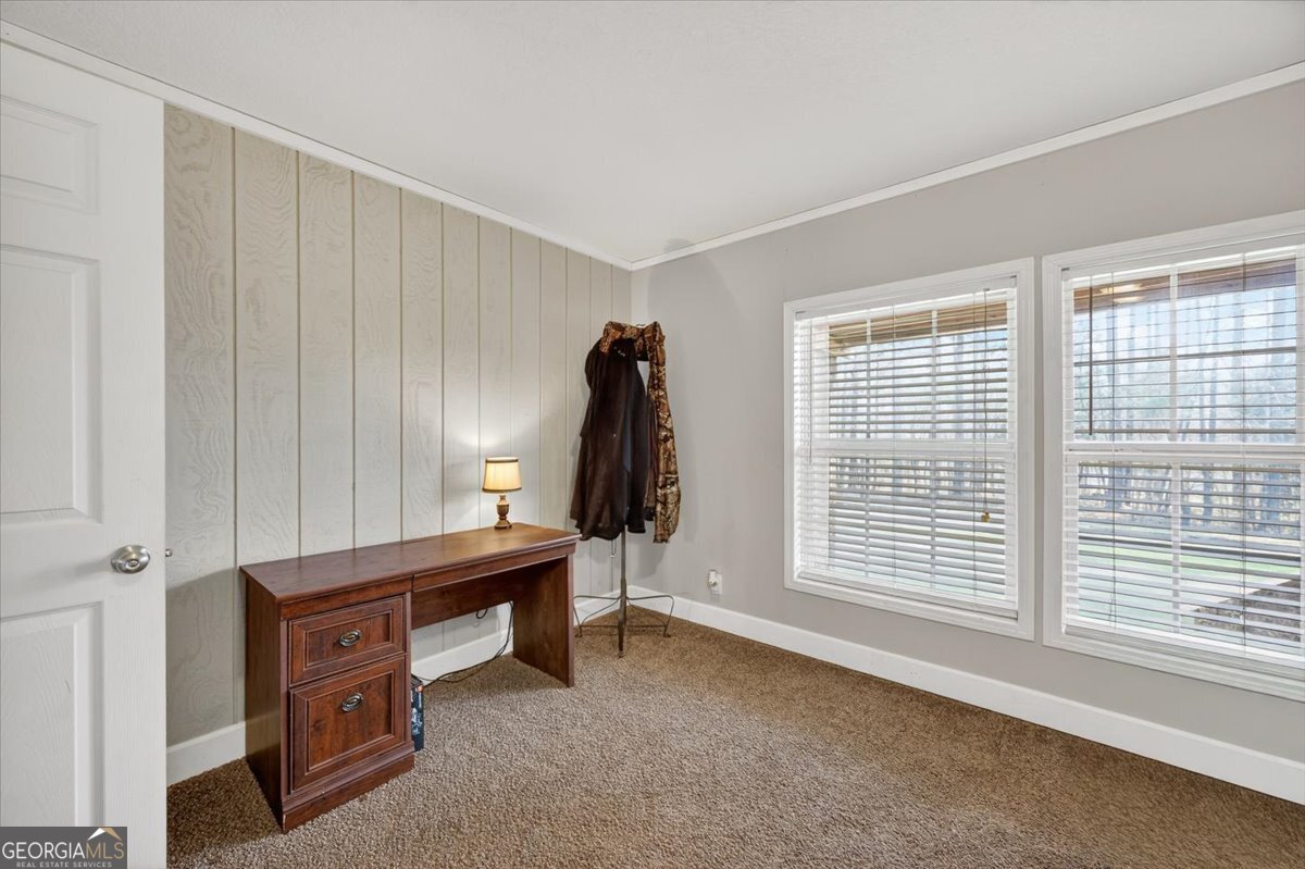 550 Damascus Church Road Haddock, GA 31033 - Photo 25 of 34 a view of a workspace with furniture and a window