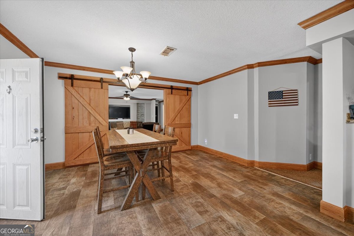 550 Damascus Church Road Haddock, GA 31033 - Photo 10 of 34 a workspace with wooden floor