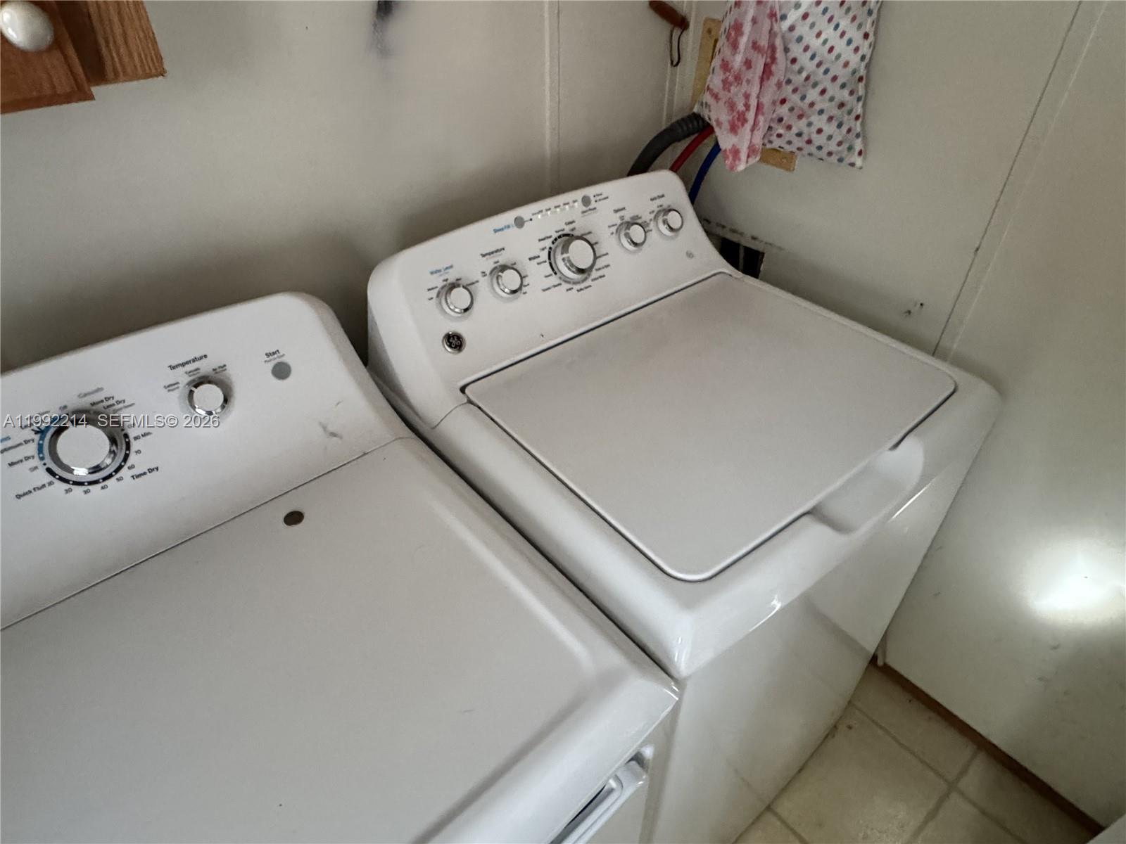 220 Northeast 12th Avenue, Unit 182 Homestead, FL 33030 - Photo 9 of 9 a utility room with dryer and washer