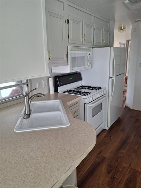 4 Fleetwood Road Cleveland, GA 30528 - Photo 20 of 45 a kitchen with stainless steel appliances granite countertop a sink stove and refrigerator