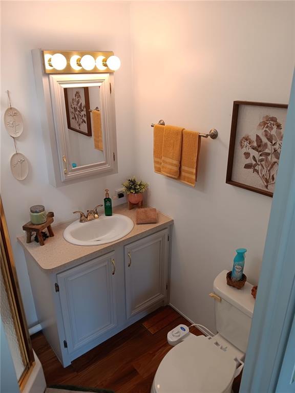 4 Fleetwood Road Cleveland, GA 30528 - Photo 32 of 45 a bathroom with a sink toilet and mirror