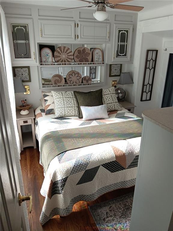 4 Fleetwood Road Cleveland, GA 30528 - Photo 39 of 45 a bedroom with a bed and a mirror