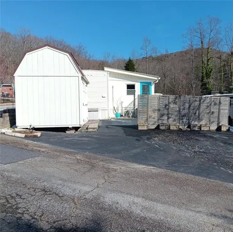 a view of a house with a garage