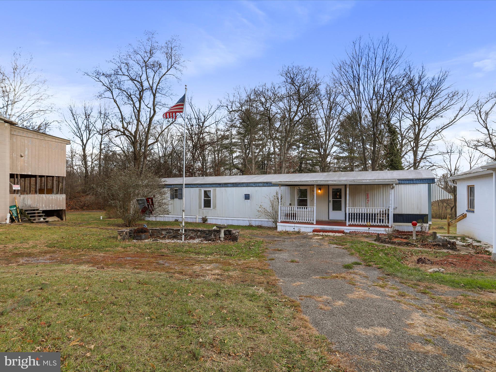 11713 Ernstville Road Big Pool, MD 21711 - Photo 2 of 47 a house that has a tree in front of it